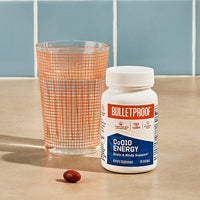 Bulletproof CoQ10 Energy softgels with glass of water