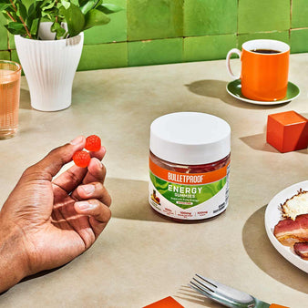 Bulletproof Energy Gummies on kitchen counter next to bacon and eggs