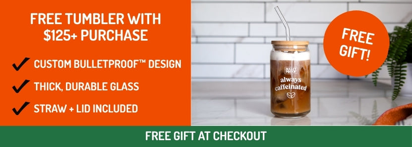 Promotional banner for a free tumbler with a purchase, featuring a bulletproof design tumbler on a table.