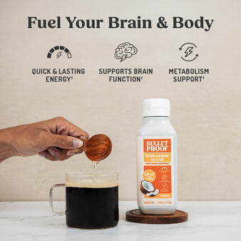 Infographic on MCT oil benefits.
Fuel your brain & body
quick & lasting energy, support brain function, metabolism support. Bulletproof brain octane MCT oil bottle next to a  cup of coffee with a hand pouring in a scoop of the oil.