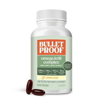 Image: Bulletproof Omega Krill Complex supplement bottle with two capsules on a white background