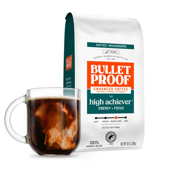 Image: Bulletproof The High Achiever coffee packaging with a glass of coffee on a white background