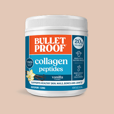 Container of Bulletproof vanilla collagen peptides on a beige background