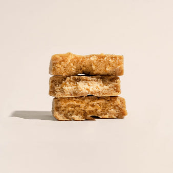 Bulletproof Collagen Protein Bar vanilla shortbread stacked on top of each other