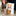 Person using a Bulletproof coffee maker with a bag of Bulletproof coffee in the background.
