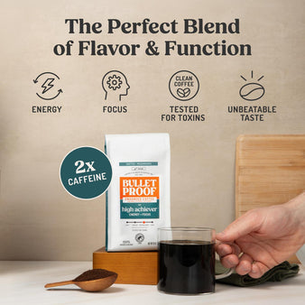 Bulletproof coffee packaging with a glass of coffee and wooden spoon on a neutral background