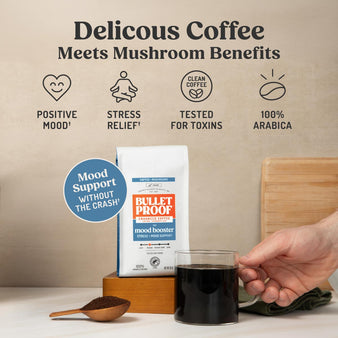 Bulletproof coffee package with a glass of coffee on a table, featuring mushroom benefits.