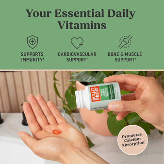 Hand holding Bulletproof supplement softgel, promotes calcium absorption, supports immunity, cardiovascular support, bone and muscle support
