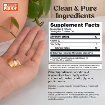Supplement pill in a hand with Bulletproof branding and supplement facts label.