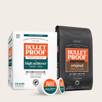 Bulletproof coffee packaging including a box, bag, and pods on a light beige background