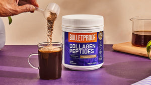 Bulletproof Chocolate Collagen Peptides scoop pouring into coffee mug
