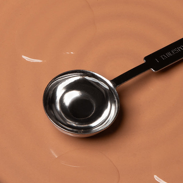 Tablespoon of mct oil on counter