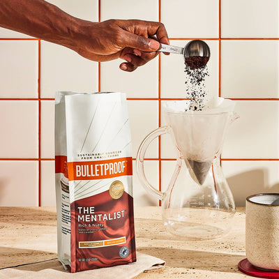 Bulletproof Mentalist Ground Coffee being poured to make coffee